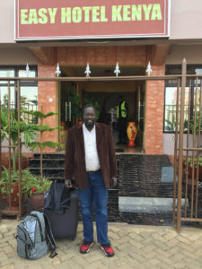 Picture of Jacob outside the Easy Hotel Kenya.