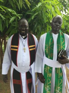 Jacob joining Pastor Makol Ngong in worship on July 1st at St. Matthew Church Parish, Sherikat, Juba, South Sudan.