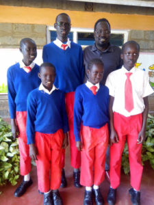 Jacob and some of the school children receiving support from the United States. Nairobi, Kenya.